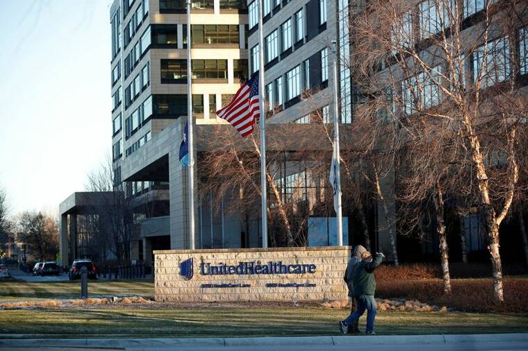 REUTERS/ERIC MILLER/FILE PHOTO
                                Flags fly at half-staff outside of the office of UnitedHealthcare, the day after the CEO of UnitedHealthcare, Brian Thompson, was shot dead, in Minnetonka, Minn., on Dec. 5. The suspect in the murder of UnitedHealth Group executive Brian Thompson was not a customer of the health insurer, a company spokesperson said today.