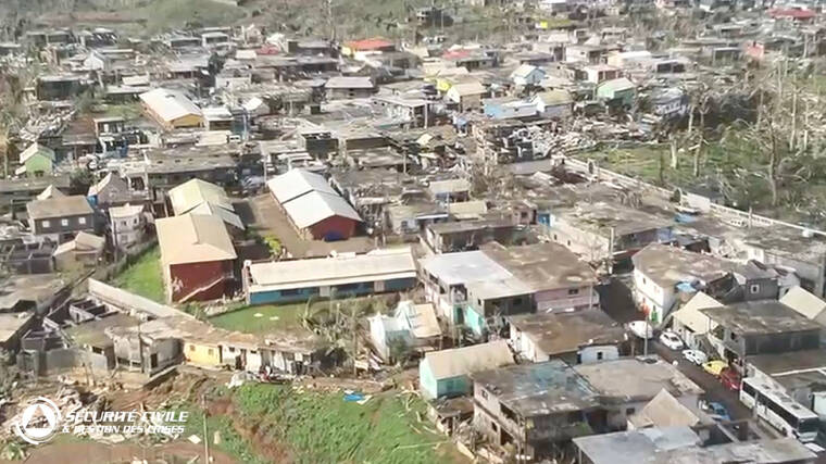 FRENCH CIVIL SECURITY/HANDOUT VIA REUTERS
                                Damaged houses remain and debris lies on the ground after Cyclone Chido swept through Mayotte, France in this screengrab taken from a handout video obtained by Reuters. Video taken with a drone.