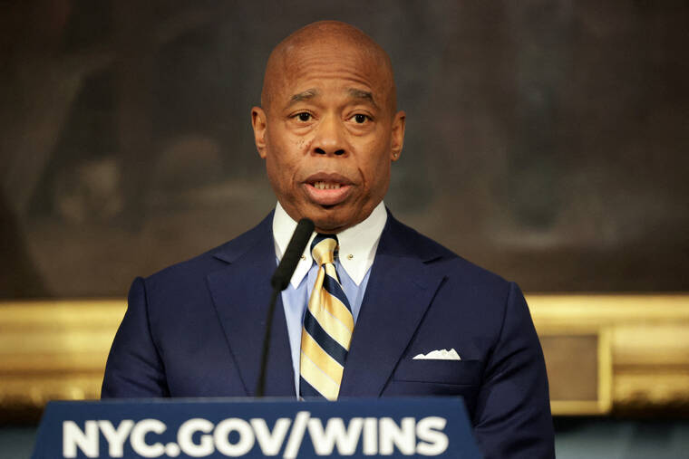 REUTERS/KENT J. EDWARDS
                                New York City Mayor Eric Adams speaks about his meeting with U.S. President-elect Donald Trump’s incoming border czar Tom Homan during a press conference at City Hall in Manhattan in New York City.