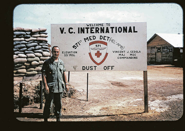 COURTESY PHOTO
                                Then-U.S. Army Maj. Vince Cedola stands in front of his unit sign in this undated photo taken during the Vietnam War.