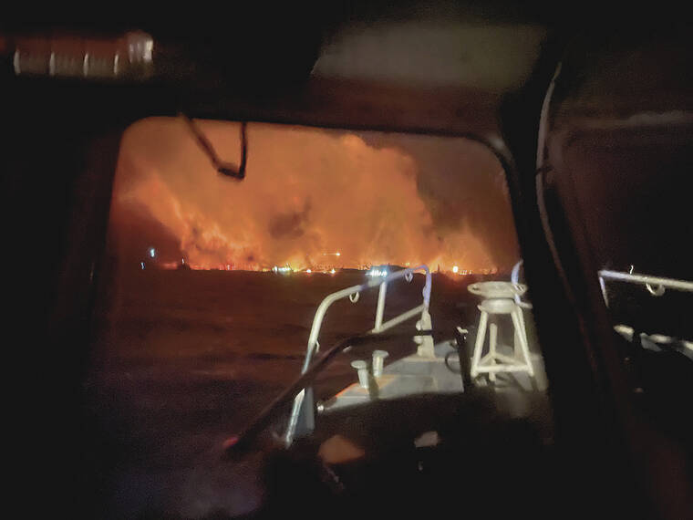 PETTY OFFICER 3RD CLASS DAVID GRAHAM / U.S. COAST GUARD
                                Coast Guard personnel with the help of civilian crews worked to save 17 people in the harbor and rescued 40 survivors along the shore in Lahaina on Aug. 8, 2023.