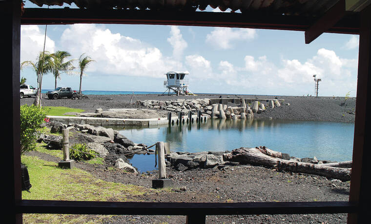 DIANE S. W. LEE / DLEE@STARADVERTISER.COM
                                Above, remains of the ramp are surrounded by black sand from the 2018 eruption of Kilauea.