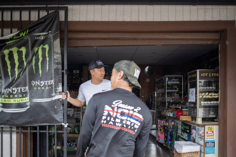 STAR-ADVERTISER / AUG. 25
                                Adam Shim decides to close Kamamalu Market on Lusitana Street after losing power for 3.5 hours on Sunday following power outages that occurred statewide due to Hurricane Hone.