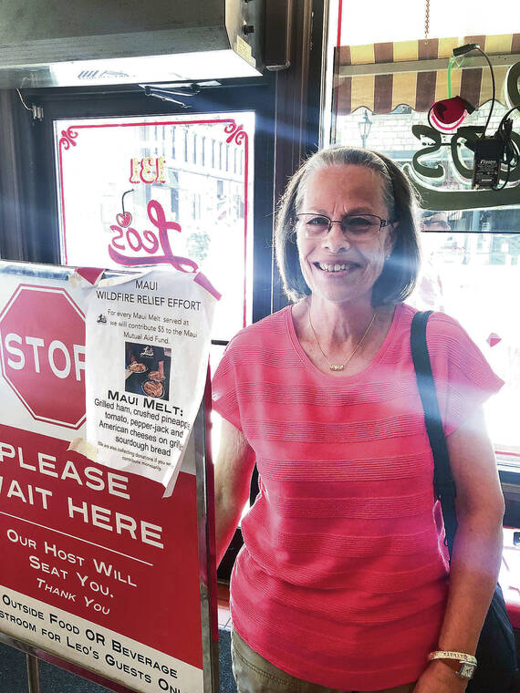 Kaneohe resident Barbara Honda went to get a bite at Leo’s in Stillwater, Minn., and was grateful to see the restaurant had created the Maui Melt, a special sandwich to generate donations for the Maui Wildfire Relief fund. Photo by Roy Honda.