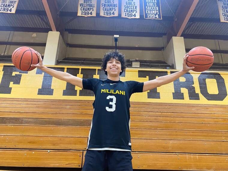 PAUL HONDA / PHONDA@STARADVERTISER.COM
                                Roman Gabriel, a 6-foot-3 senior at Mililani, showed off his length on Monday.